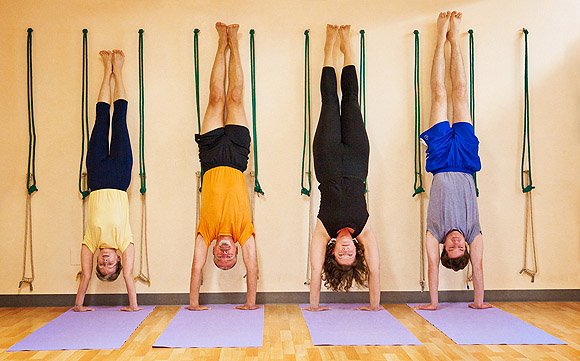 hand stands against the wall